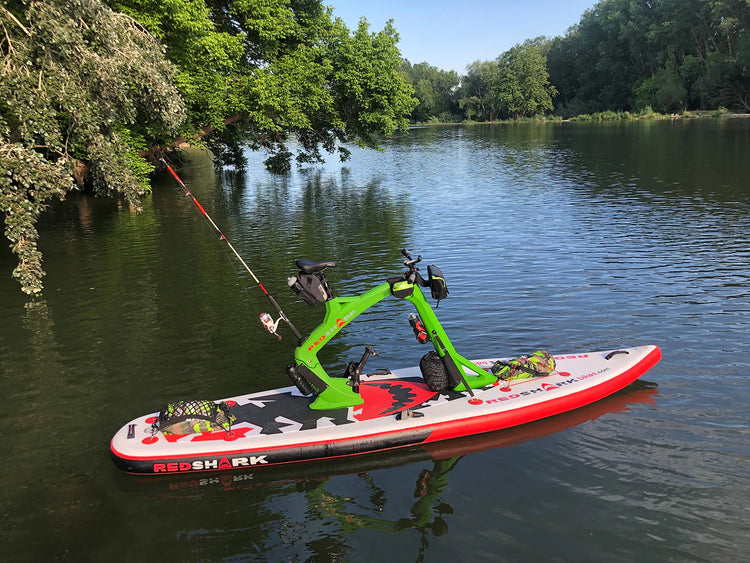 Fisherman on inflatable kayak casting a line on Flathead Lake | Rent fishing gear from MTBoarders.com with delivery included. Or buy now at e-boarders.com