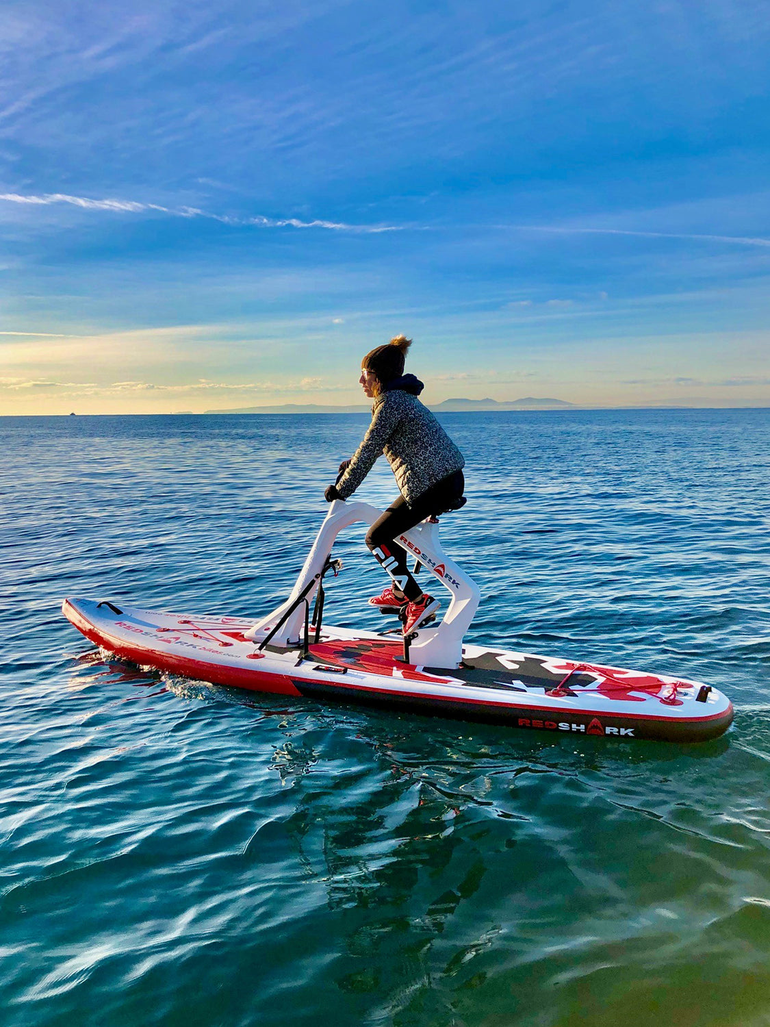 Pedal-powered Surf-Cycle water bike rental on Flathead Lake—delivered to lake cabins, docks, and Montana waterfronts for family-friendly cruising fun. Rent at MontanaBoarders.com and purchase from flagship partner eboarders.com