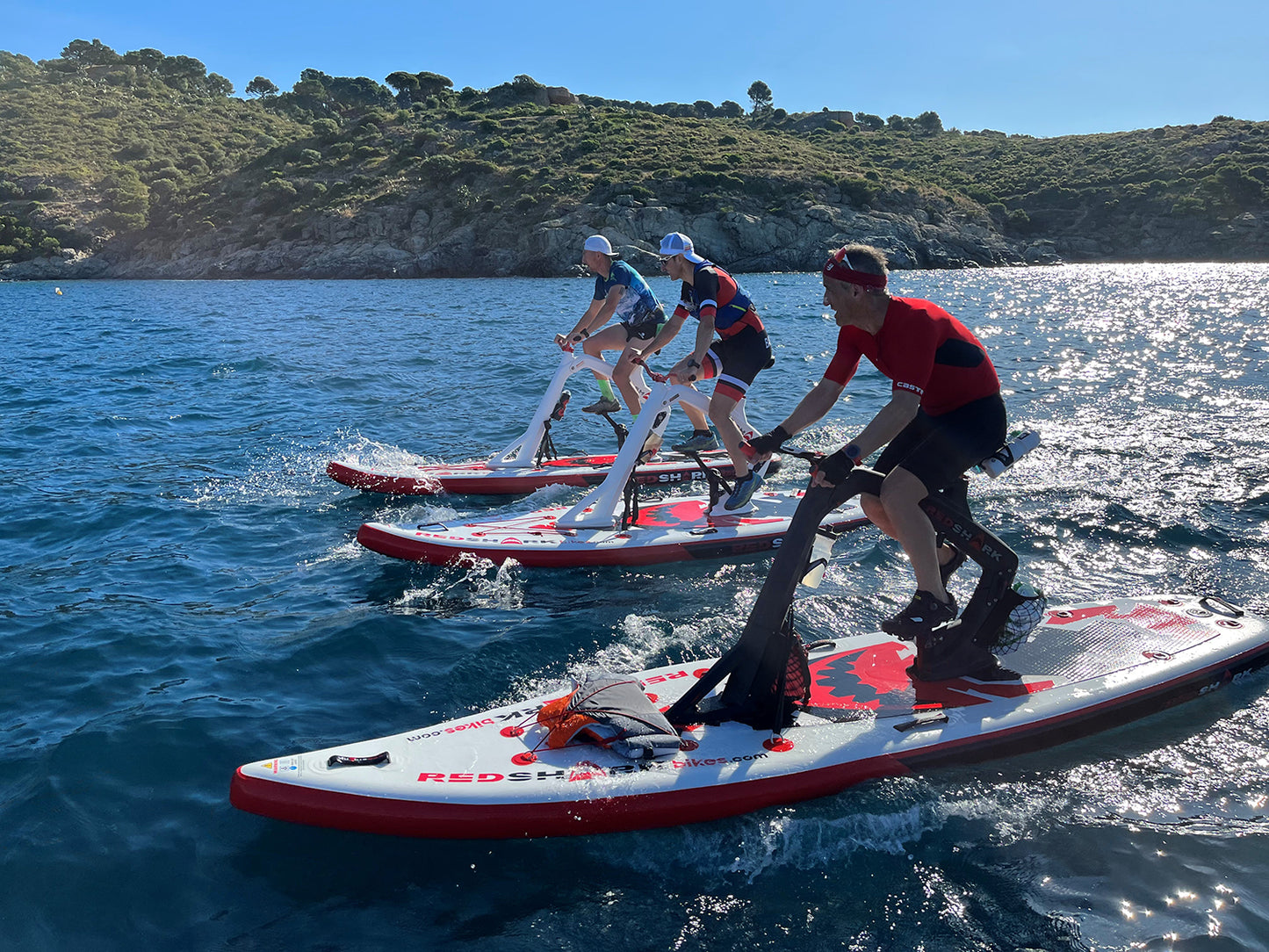 Pedal-powered Surf-Cycle water bike rental on Flathead Lake—delivered to lake cabins, docks, and Montana waterfronts for family-friendly cruising fun. Rent at MontanaBoarders.com