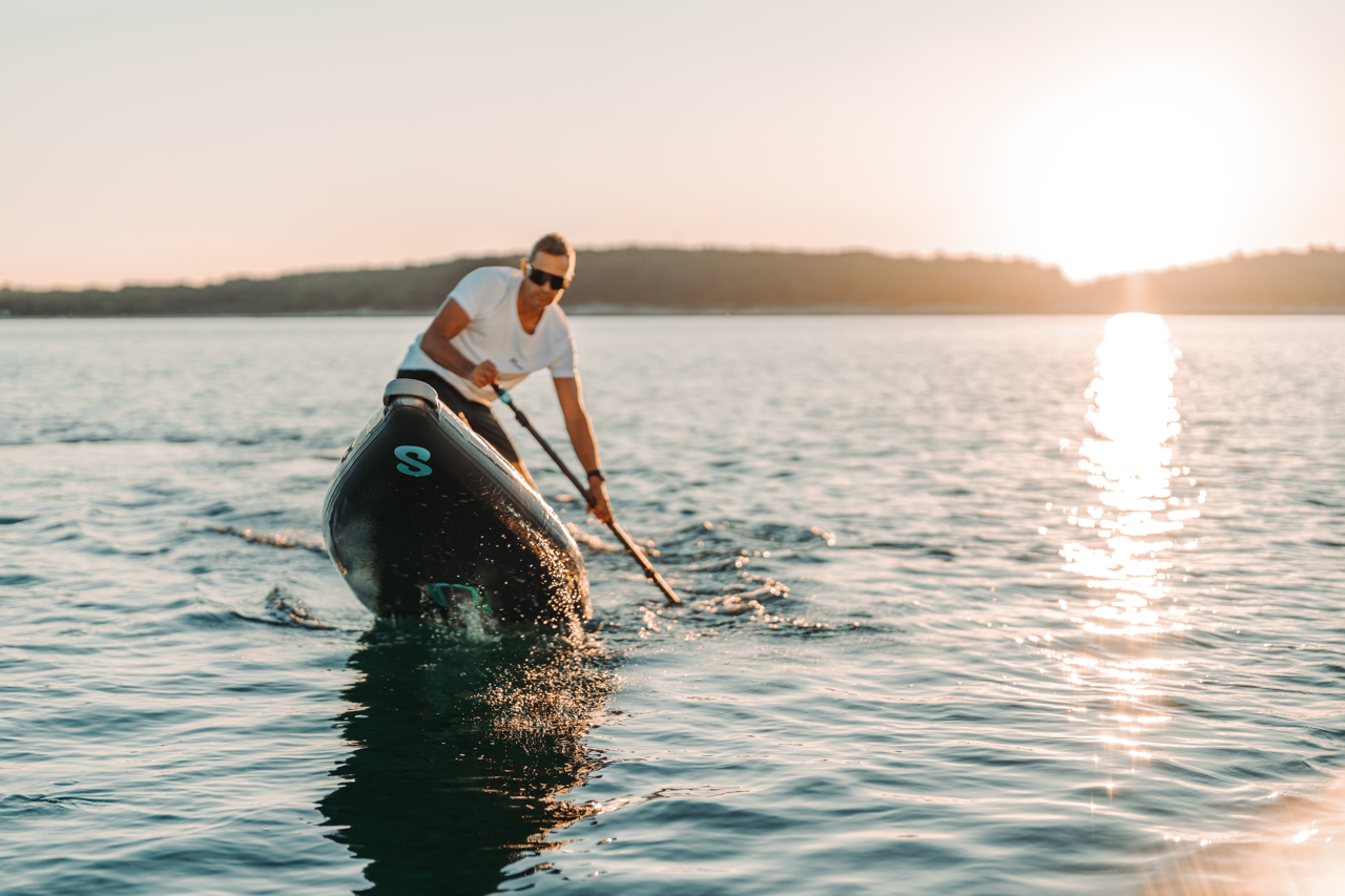 SipaBoards self-inflating electric paddleboard rental with built-in propulsion and Bluetooth remote, delivered to Flathead Valley lakefronts.
