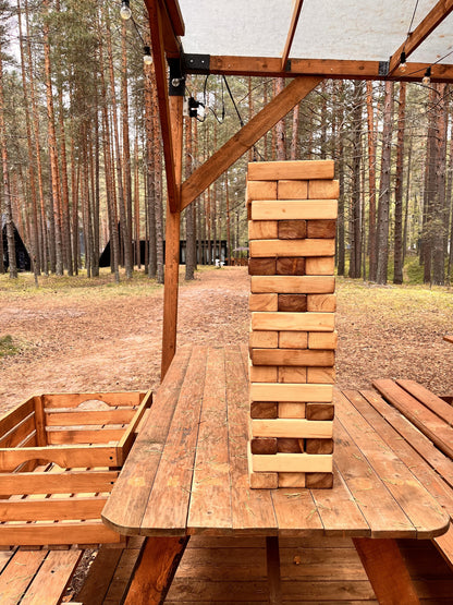 Giant Jenga yard game rental set up on lawn at Flathead Lake vacation home